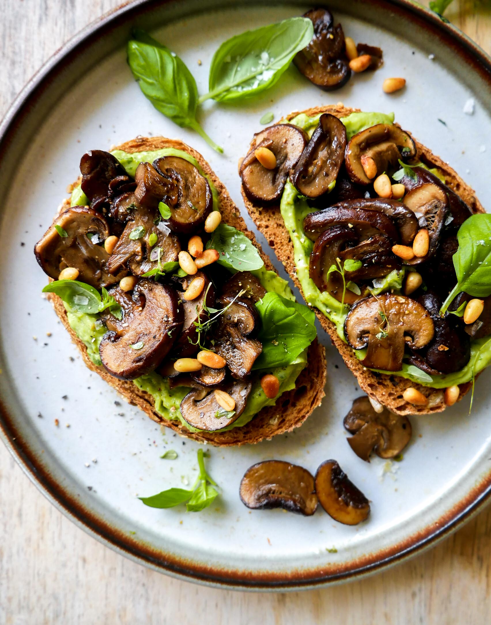 creamy avocado toasts with fried mushrooms
