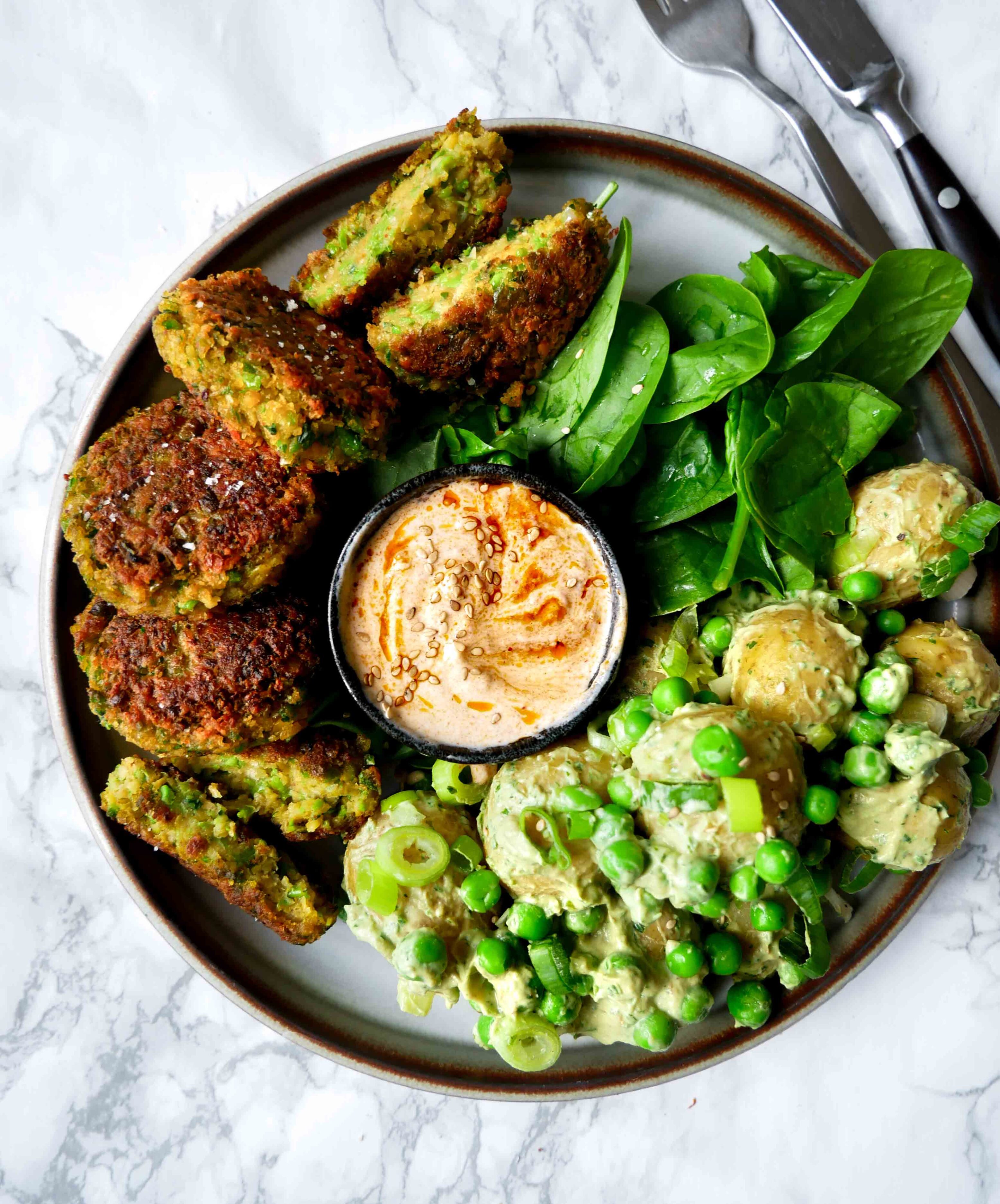 vegan pea patty bowl with potato salad